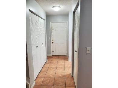 Townhouse Style Condo in Paseo Real Community in Kendall, this on Miccosukee Golf and Country Club in Florida - for sale on GolfHomes.com, golf home, golf lot