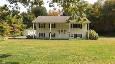 This split level home has fantastic curb appeal & is surrounded on Blackstone National Golf Course in Massachusetts - for sale on GolfHomes.com, golf home, golf lot