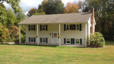 This split level home has fantastic curb appeal & is surrounded on Blackstone National Golf Course in Massachusetts - for sale on GolfHomes.com, golf home, golf lot