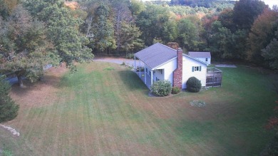 This split level home has fantastic curb appeal & is surrounded on Blackstone National Golf Course in Massachusetts - for sale on GolfHomes.com, golf home, golf lot