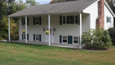 This split level home has fantastic curb appeal & is surrounded on Blackstone National Golf Course in Massachusetts - for sale on GolfHomes.com, golf home, golf lot