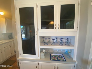 This cozy, bright park model home features a huge covered deck on Juniper Ridge R.V. Golf Resort in Arizona - for sale on GolfHomes.com, golf home, golf lot