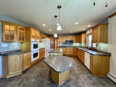 Meticulously maintained 3-bedroom ranch nestled on a spacious on Quit Qui Oc Golf Club in Wisconsin - for sale on GolfHomes.com, golf home, golf lot