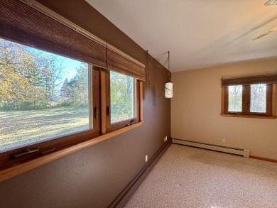 Meticulously maintained 3-bedroom ranch nestled on a spacious on Quit Qui Oc Golf Club in Wisconsin - for sale on GolfHomes.com, golf home, golf lot