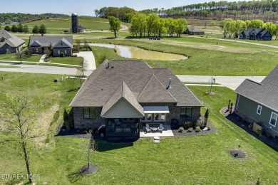 Nestled within the picturesque Tennessee National Gated Lake and on Tennessee National Golf Club in Tennessee - for sale on GolfHomes.com, golf home, golf lot