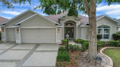 Highly desirable Block/Stucco 3/2 with 2 car + golf cart garage on The Links of Spruce Creek in Florida - for sale on GolfHomes.com, golf home, golf lot