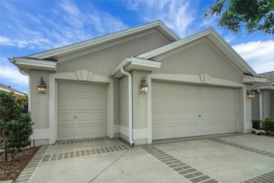 Highly desirable Block/Stucco 3/2 with 2 car + golf cart garage on The Links of Spruce Creek in Florida - for sale on GolfHomes.com, golf home, golf lot