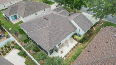 Highly desirable Block/Stucco 3/2 with 2 car + golf cart garage on The Links of Spruce Creek in Florida - for sale on GolfHomes.com, golf home, golf lot