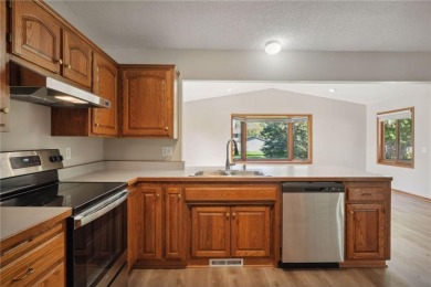 This spacious and sprawling home is beautifully situated on a on Castlewood Golf Course in Minnesota - for sale on GolfHomes.com, golf home, golf lot