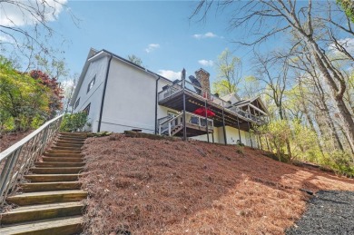 Widen your eyes and step into the realm of sophistication and on Indian Hills Country Club in Georgia - for sale on GolfHomes.com, golf home, golf lot