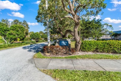 Updated where it counts...both baths have been updated with step on The Little Club in Florida - for sale on GolfHomes.com, golf home, golf lot