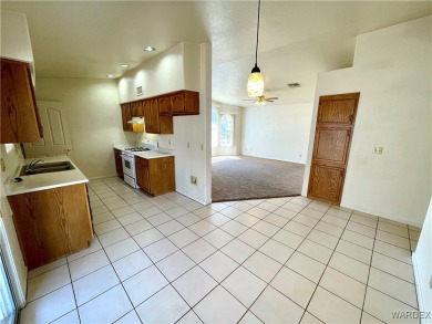 Don't miss out on this great 3 Bedroom 2 Bath home in the center on Cerbat Cliffs Golf Course in Arizona - for sale on GolfHomes.com, golf home, golf lot