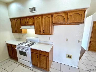 Don't miss out on this great 3 Bedroom 2 Bath home in the center on Cerbat Cliffs Golf Course in Arizona - for sale on GolfHomes.com, golf home, golf lot