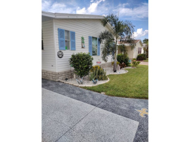 This Immaculate 1260 sq ft home features two bedroom and two on Four Lakes Golf Club in Florida - for sale on GolfHomes.com, golf home, golf lot