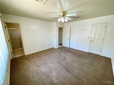 Don't miss out on this great 3 Bedroom 2 Bath home in the center on Cerbat Cliffs Golf Course in Arizona - for sale on GolfHomes.com, golf home, golf lot