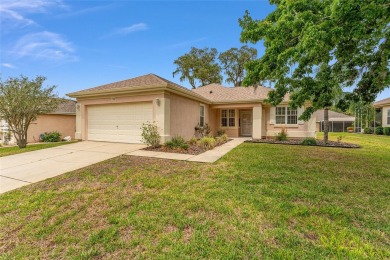 This furnished 2-bedroom, 2-bath home is located in the highly on Eagle Ridge At Spruce Creek Country Club in Florida - for sale on GolfHomes.com, golf home, golf lot