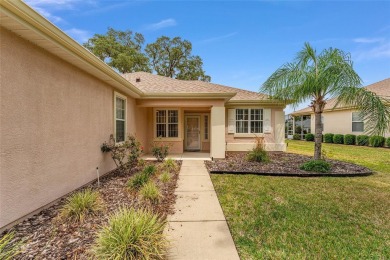 This furnished 2-bedroom, 2-bath home is located in the highly on Eagle Ridge At Spruce Creek Country Club in Florida - for sale on GolfHomes.com, golf home, golf lot