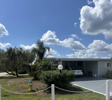 Spacious Corner Lot Gem: Furnished 2-Bedroom Palm Harbor Home on Schalamar Creek Golf and Country Club in Florida - for sale on GolfHomes.com, golf home, golf lot