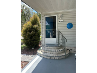 Spacious Corner Lot Gem: Furnished 2-Bedroom Palm Harbor Home on Schalamar Creek Golf and Country Club in Florida - for sale on GolfHomes.com, golf home, golf lot