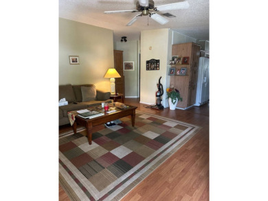 Spacious Corner Lot Gem: Furnished 2-Bedroom Palm Harbor Home on Schalamar Creek Golf and Country Club in Florida - for sale on GolfHomes.com, golf home, golf lot