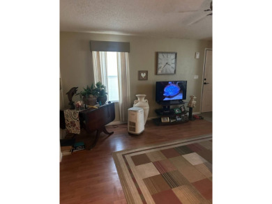 Spacious Corner Lot Gem: Furnished 2-Bedroom Palm Harbor Home on Schalamar Creek Golf and Country Club in Florida - for sale on GolfHomes.com, golf home, golf lot