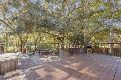 This gorgeous, custom home in the high demand  Oaks of Pass on The Oaks Golf Club in Mississippi - for sale on GolfHomes.com, golf home, golf lot