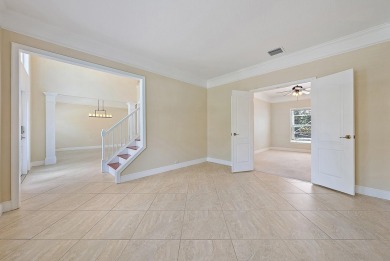 Nestled in a cul-de-sac in the sought-after community of Egret on The Golf Club of Jupiter in Florida - for sale on GolfHomes.com, golf home, golf lot