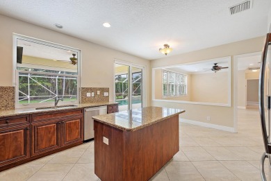 Nestled in a cul-de-sac in the sought-after community of Egret on The Golf Club of Jupiter in Florida - for sale on GolfHomes.com, golf home, golf lot