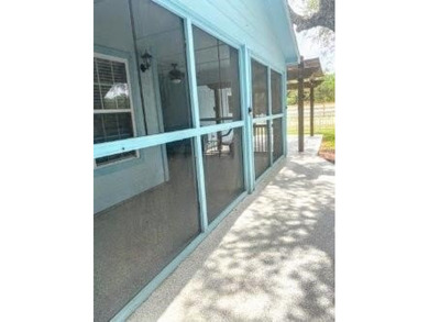 Coastal Cottage Charm: Well-maintained 2-Bed, 2-Bath with Bonus on Rockport Country Club in Texas - for sale on GolfHomes.com, golf home, golf lot