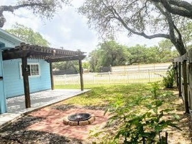 Coastal Cottage Charm: Well-maintained 2-Bed, 2-Bath with Bonus on Rockport Country Club in Texas - for sale on GolfHomes.com, golf home, golf lot