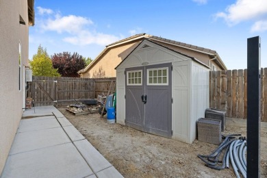 Nestled on the largest lot on the golf course in Lemoore, this on Lemoore Municipal Golf Course in California - for sale on GolfHomes.com, golf home, golf lot