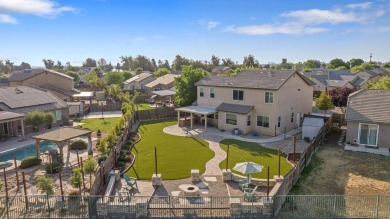 Nestled on the largest lot on the golf course in Lemoore, this on Lemoore Municipal Golf Course in California - for sale on GolfHomes.com, golf home, golf lot