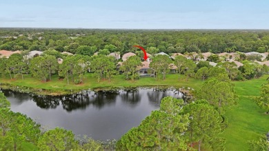 Stunning Pool Home on the Water in PGA Village! Beautifully on The Legacy Golf and Tennis Club in Florida - for sale on GolfHomes.com, golf home, golf lot