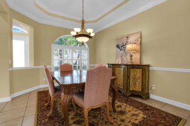 Stunning Pool Home on the Water in PGA Village! Beautifully on The Legacy Golf and Tennis Club in Florida - for sale on GolfHomes.com, golf home, golf lot