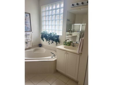 This beautiful home, overlooking the lush fairway of the on St. James Golf Club in Florida - for sale on GolfHomes.com, golf home, golf lot