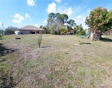 Seller is offering $5,000 toward buyer's closing costs! This on Lehigh Resort Club in Florida - for sale on GolfHomes.com, golf home, golf lot