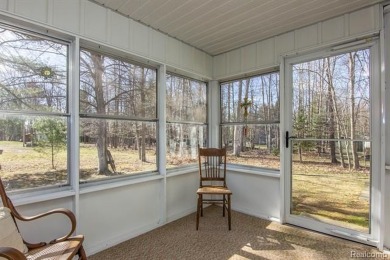 Welcome to your Up North getaway or your year round home inside on Lost Lake Woods Club in Michigan - for sale on GolfHomes.com, golf home, golf lot