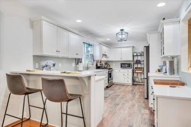 1037 Whitetail Dr is a beautifully maintained all-brick modern on Mariners Landing Golf and Country Club in Virginia - for sale on GolfHomes.com, golf home, golf lot