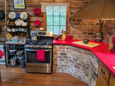 This impeccably maintained, climate-controlled, historic Log on Lucerne In Maine Golf Course in Maine - for sale on GolfHomes.com, golf home, golf lot