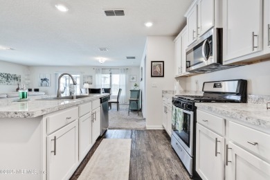 Located in the desirable Grand Reserve golf course community on Grand Reserve Golf Course in Florida - for sale on GolfHomes.com, golf home, golf lot