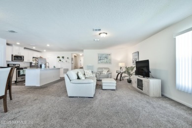 Located in the desirable Grand Reserve golf course community on Grand Reserve Golf Course in Florida - for sale on GolfHomes.com, golf home, golf lot