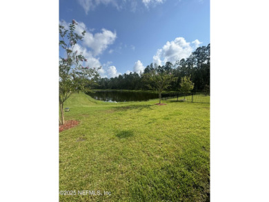 Located in the desirable Grand Reserve golf course community on Grand Reserve Golf Course in Florida - for sale on GolfHomes.com, golf home, golf lot