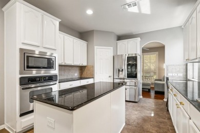 Welcome to 2130 Heather Glen Drive - Your Private Retreat in The on The Shores Country Club in Texas - for sale on GolfHomes.com, golf home, golf lot
