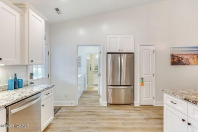 Coastal charm and a fantastic location come together in this on Oak Island Golf Club in North Carolina - for sale on GolfHomes.com, golf home, golf lot