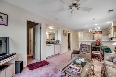 Location! Location! Location! This first-floor, end-unit condo on River Oaks Golf Plantation  in South Carolina - for sale on GolfHomes.com, golf home, golf lot