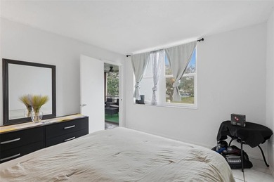 Rent from day 1. Updated 2-bedroom, 2-bath residence featuring a on Pine Island Ridge Country Club in Florida - for sale on GolfHomes.com, golf home, golf lot