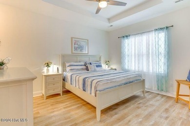 Coastal charm and a fantastic location come together in this on Oak Island Golf Club in North Carolina - for sale on GolfHomes.com, golf home, golf lot