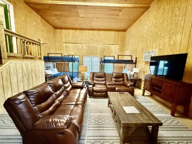 Charming cabin in the heart of Pickwick!  Minutes to golf course on Shiloh Falls Golf Club in Tennessee - for sale on GolfHomes.com, golf home, golf lot