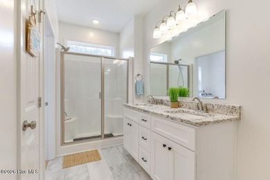 Coastal charm and a fantastic location come together in this on Oak Island Golf Club in North Carolina - for sale on GolfHomes.com, golf home, golf lot