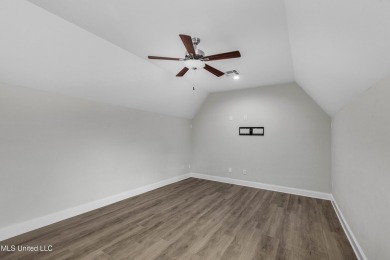 Do not miss this Beautiful white brick home with wonderful on Lake Caroline Golf Club in Mississippi - for sale on GolfHomes.com, golf home, golf lot
